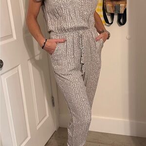 Dress Forum Gray Jumpsuit with Drawstring Waist and Relaxed Fit